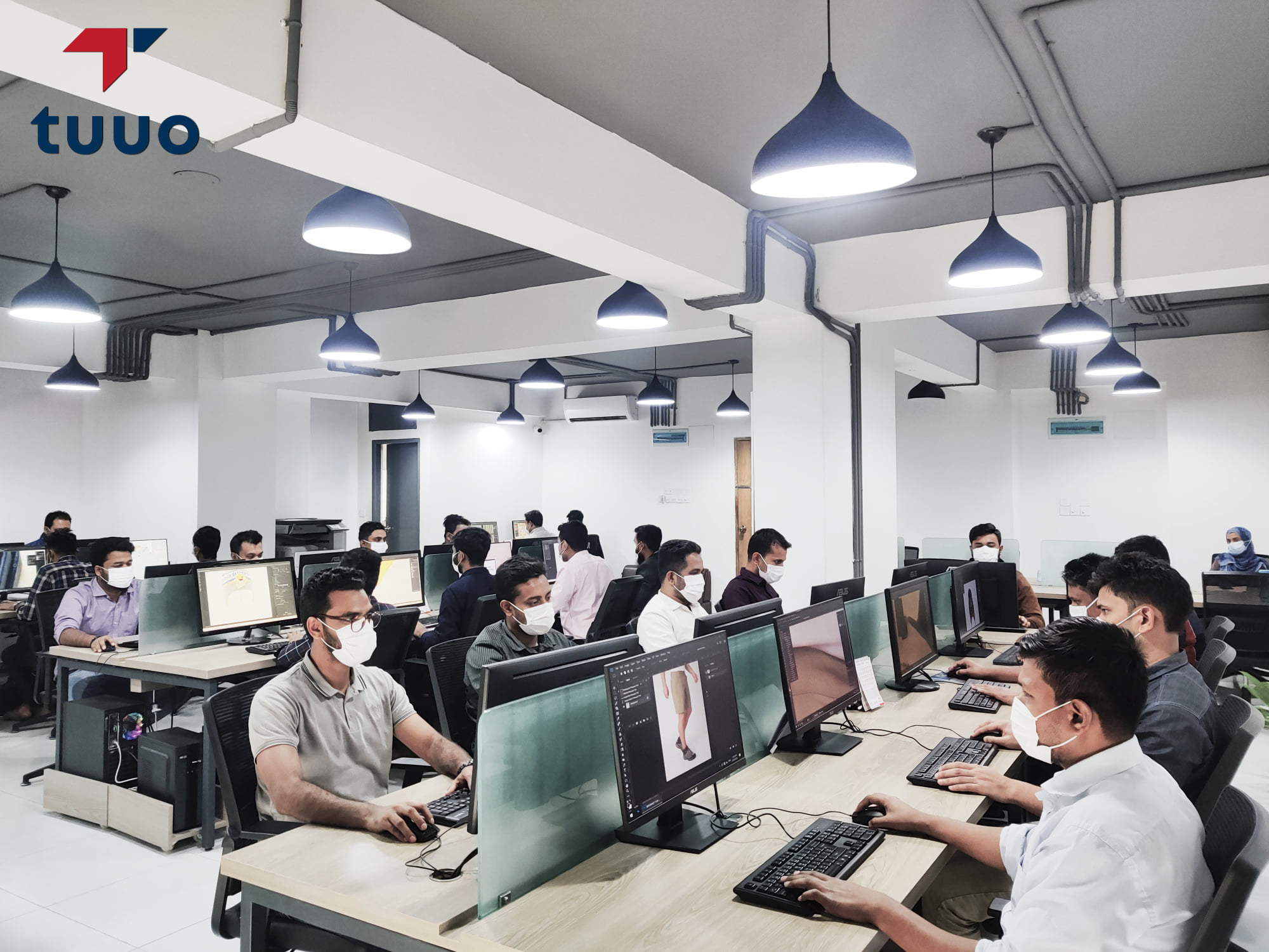 Analytics hub with multiple monitors and data visualization
